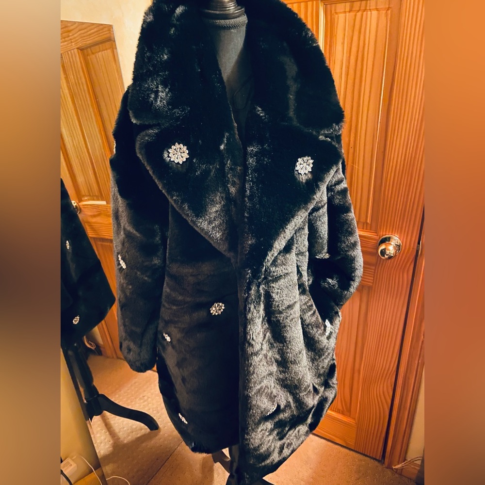 Black faux fur embellished coat